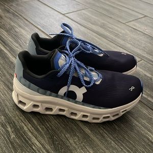 On Running Blue and White Athletic Shoes